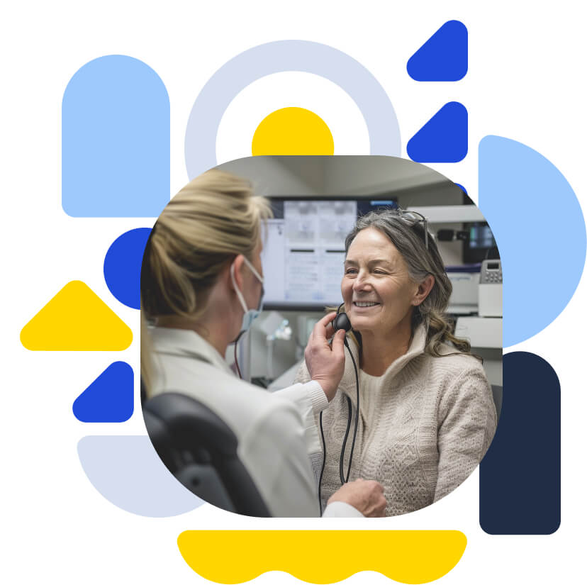 An audiologist checking out a patient