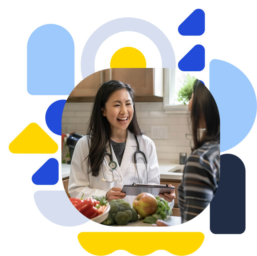 A nutritionist guiding a patient through healthy eating choices